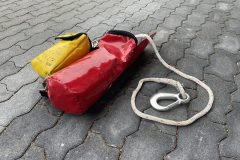 Fluchthaube und Leinenbeutel